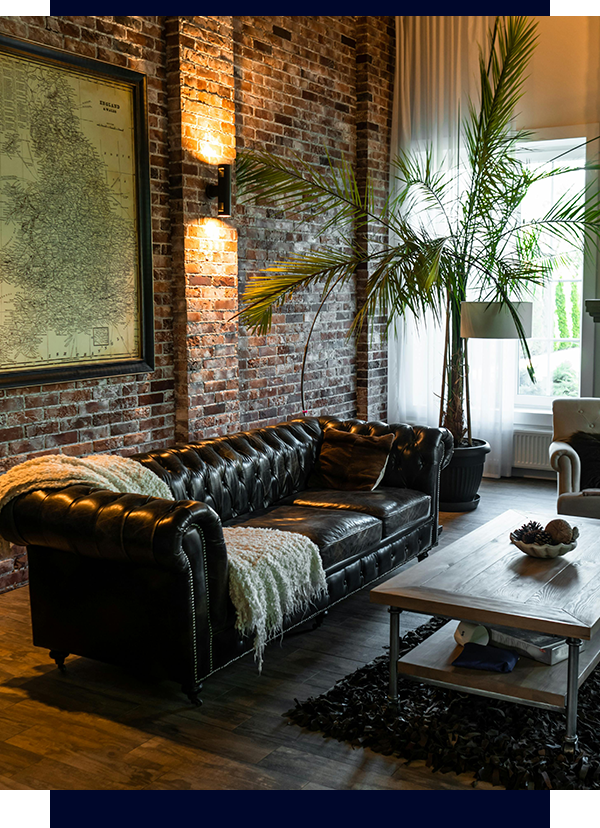 A living room with a couch and coffee table